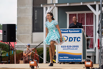 Is That Her Proud Mamma In The Back?