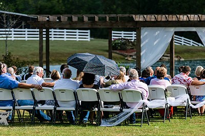 The Lady On The Backrow Holding The Umbrella Has My Respect